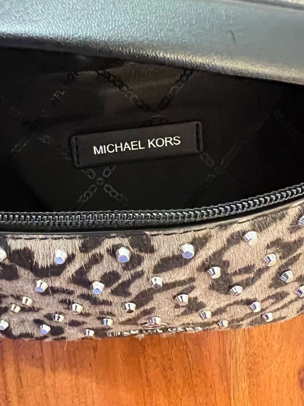 Michael Kors animal print calf hair cross body adjustable Sling Pack